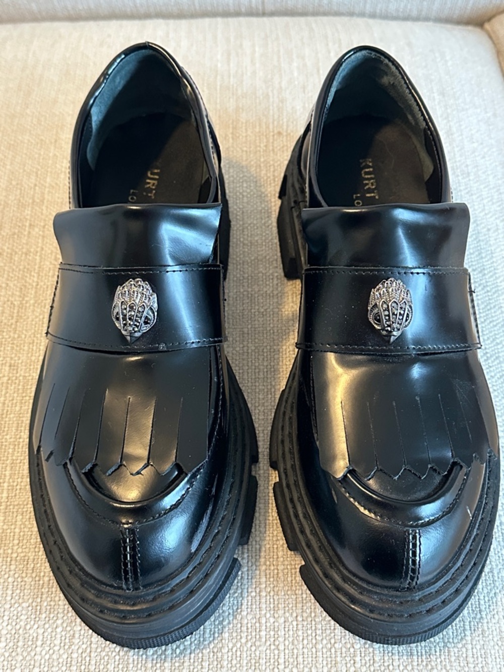 Kurt Geiger Black Leather Fringe Loafers with Silver Crest Detail
